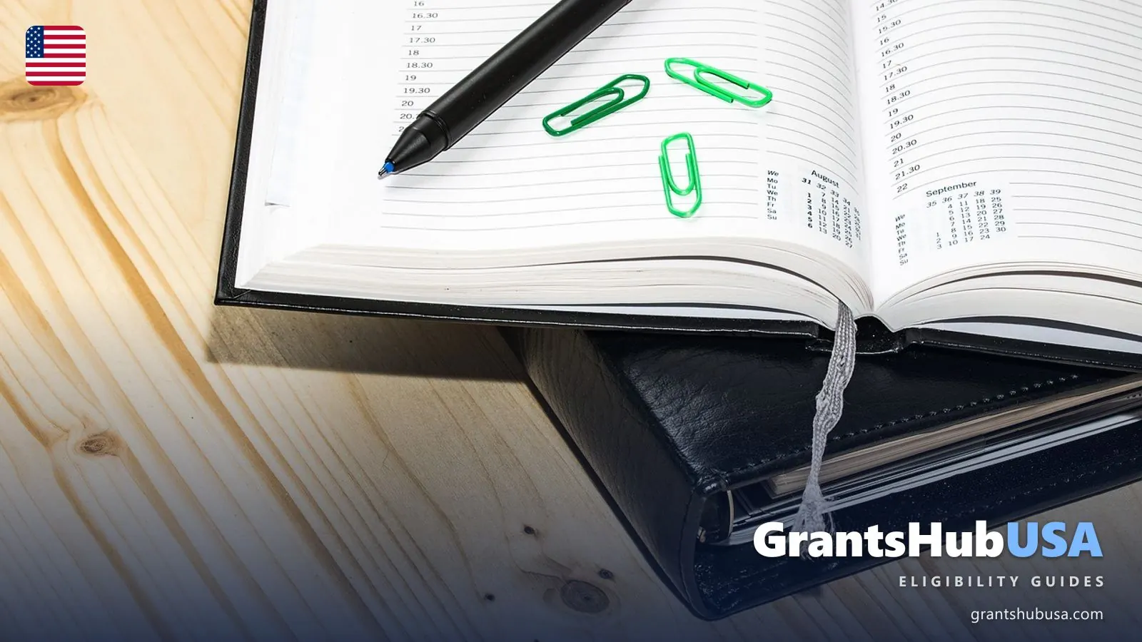 Open appointment diary with a pen and paper clips on a wooden desk, illustrating the Social Security payment schedule for November 2026 and 2027. GrantsHubUSA Social Security guide.